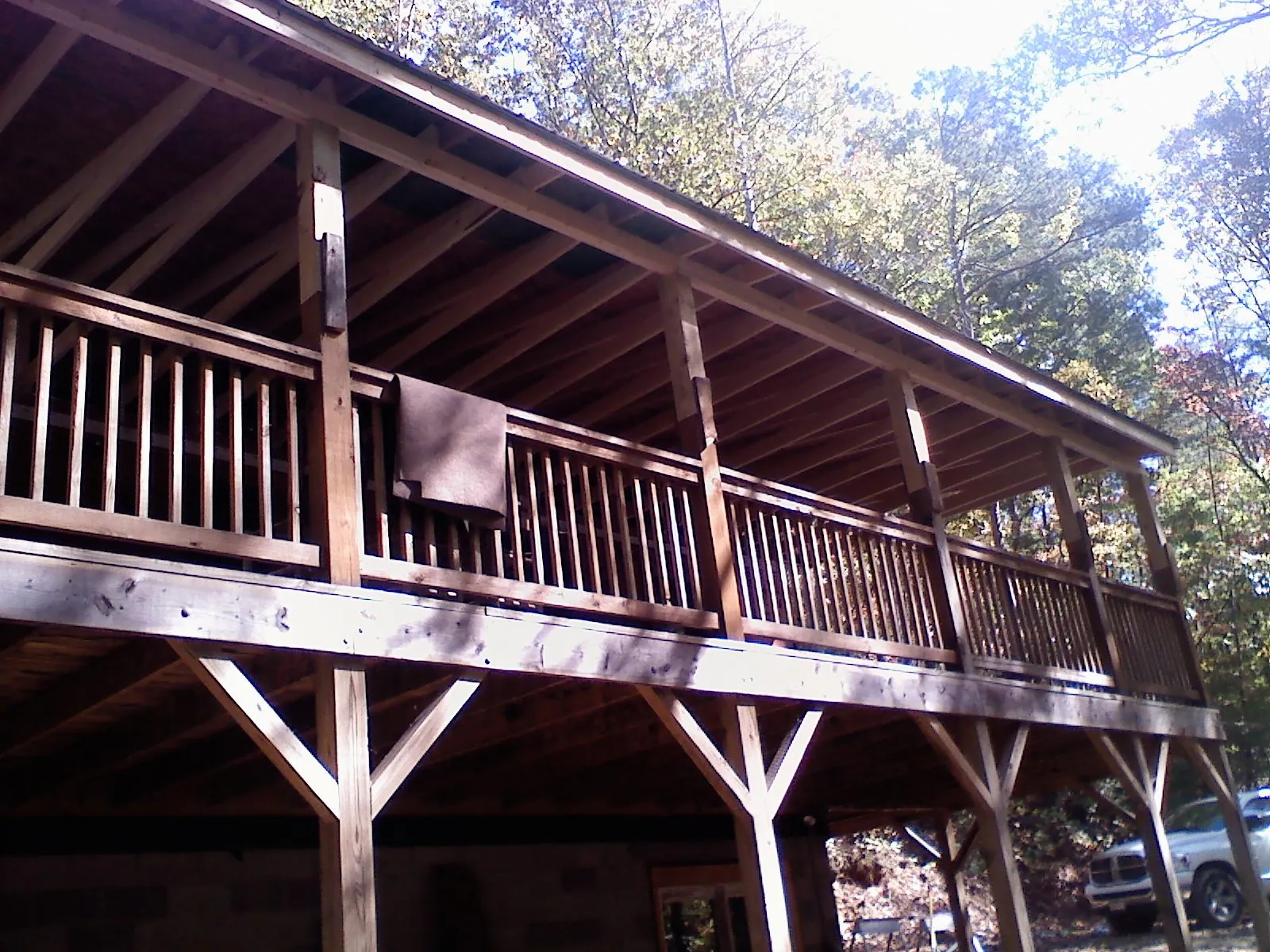 Timber framing under a new elevated porch and deck — Roof Leak Repair in Clifton Park by Roofing Brothers
